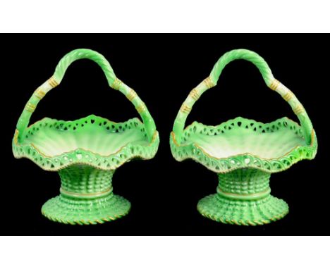 A PAIR OF ROYAL WORCESTER SHADED GREEN POSY BASKETS, WITH PIERCED RIM, 12CM H, PRINTED MARK, CIRCA 1900