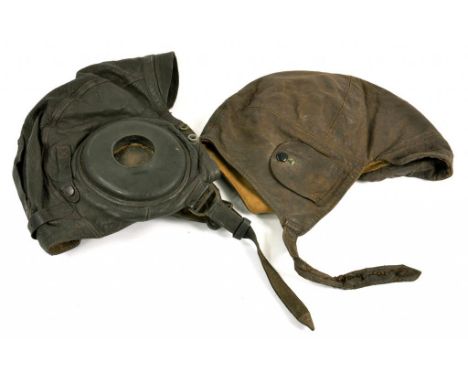 A WORLD WAR II UNITED STATES AIR FORCE LEATHER FLYING HELMET AND ANOTHER, THE FIRST LABELLED TYPE A...THE SELBY SHOE CO, PROP