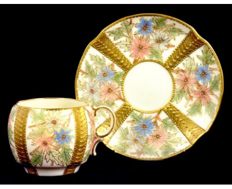 A GRAINGER & CO WORCESTER CABINET CUP AND SAUCER DECORATED IN SHADED ENAMELS AND RAISED GILDING WITH PANELS OF FLOWERS, SAUCE