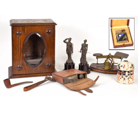 AN EDWARDIAN OAK SMOKER'S CABINET, 31CM H, A VICTORIAN BRASS POSTAL BALANCE, A PAIR OF FRENCH SPELTER STATUETTES, A FRENCH AR