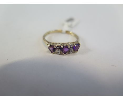 A hallmarked 9ct yellow gold amethyst and diamond ring, size O, approx 1.6 grams - new condition, ex jewellers stock 