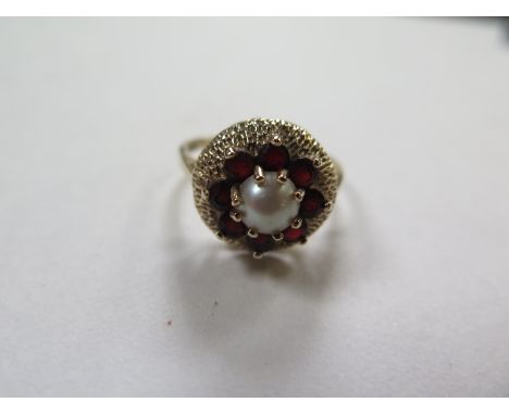A hallmarked 9ct gold ring set with a single pearl, size Q, approx 3.7 grams, some minor wear 