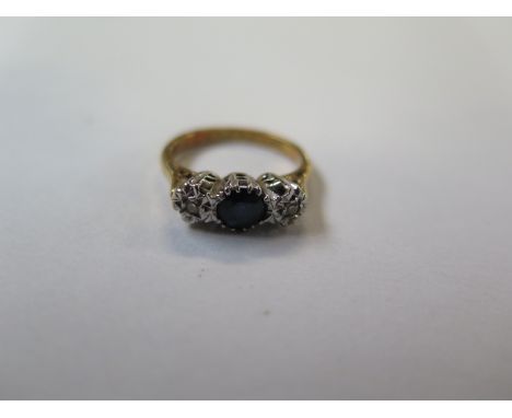 An 18ct hallmarked yellow gold sapphire and diamond illusion set ring - size G/H - total weight approx 1.6 grams - some usage
