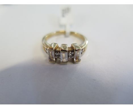 A hallmarked 9ct yellow gold rainbow moonstone ring - size N, approx 3.4 grams - new condition, ex jewellers stock 