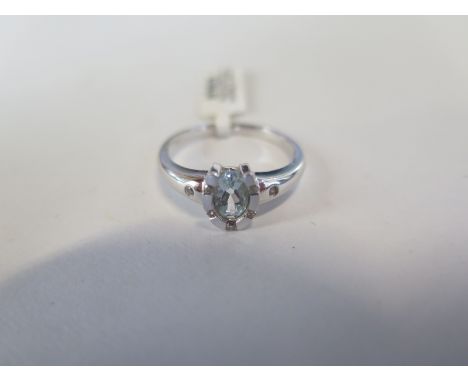 A 9ct white gold topaz and diamond horse shoe ring, size N, approx 2.7 grams, marked 9K - new condition, ex jewellers stock 