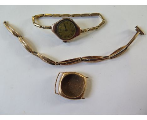 A 9ct gold ladies manual wind wrist watch, with sprung 9ct strap, approx total weight 13.5 grams, not working - a 14ct watch 
