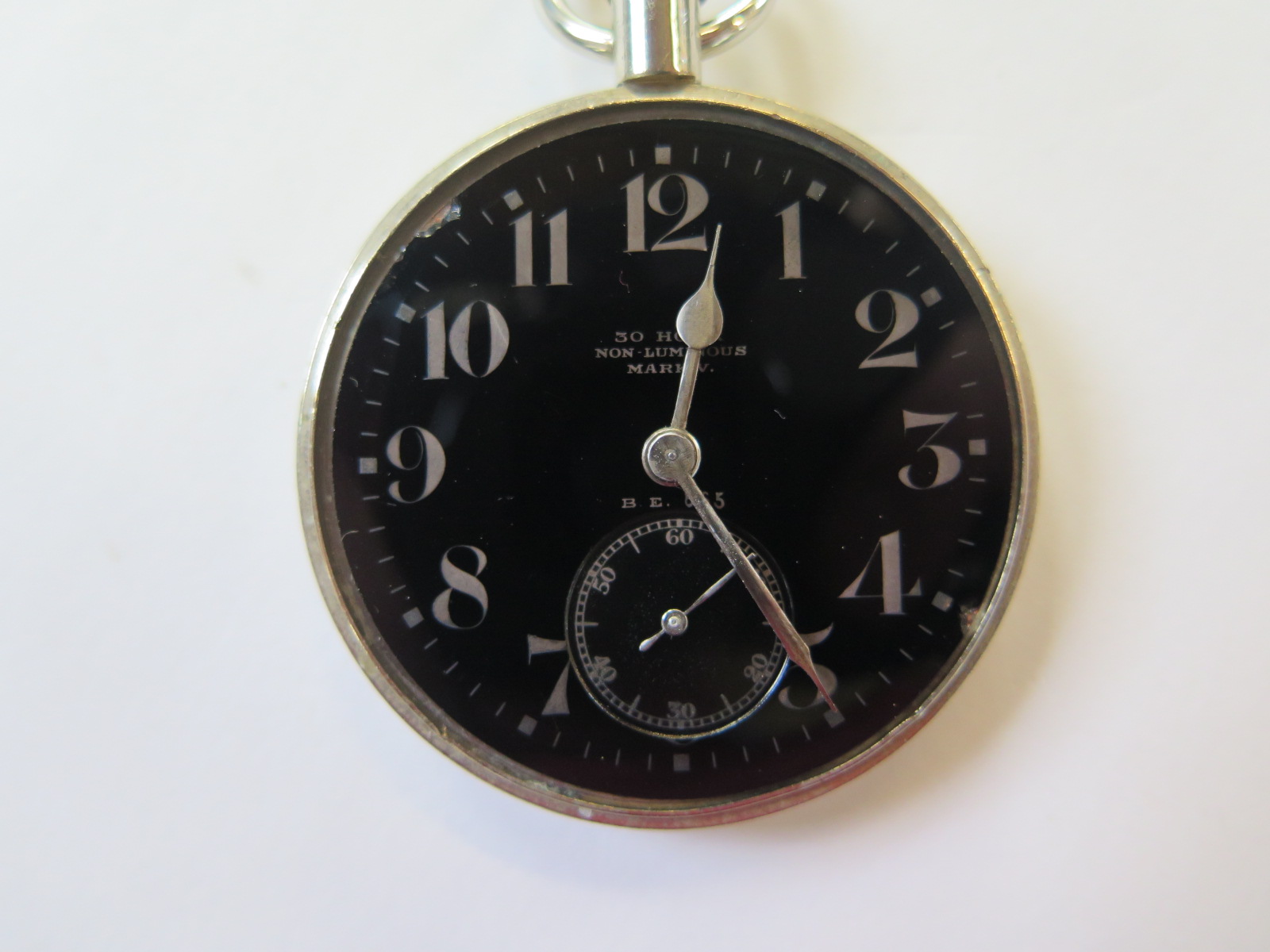 A 30 hour non luminous Mark V Military pocket watch, idal numbered