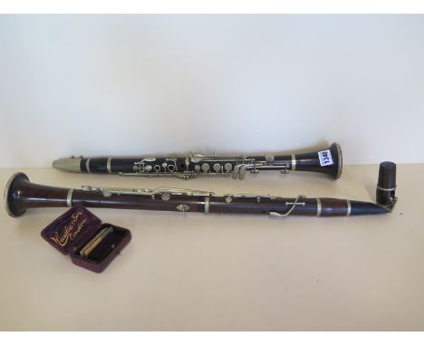 A Hawkes and Son Excelsior class clarinet and another clarinet with a Hawkes and son mouthpiece 