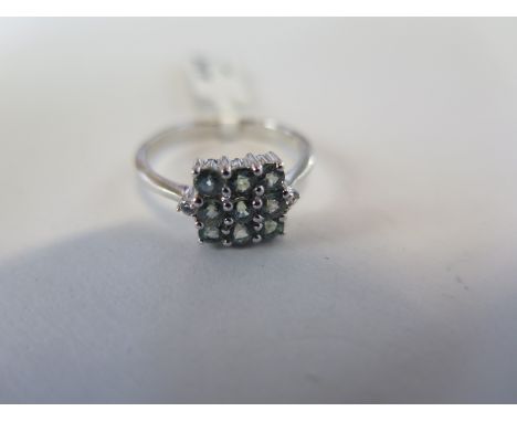 A hallmarked 9ct white gold tourmaline ring, size N, approx 2.6 grams - new condition, ex jewellers stock 