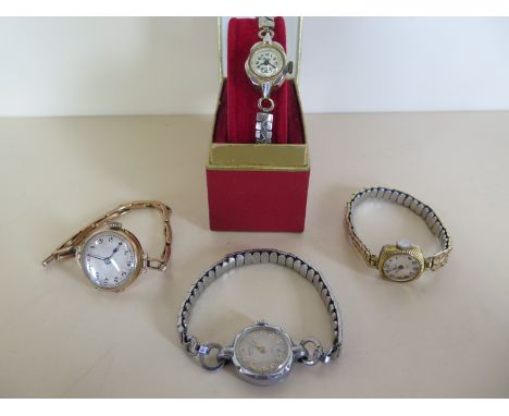 Four vintage style ladies wristwatches, a Rotary, a Lucerne with an associated watch box, a Sekonda and a 9 ct gold cased wri