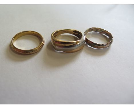 Two 9ct yellow gold rings, approx 5.5 grams, size O - and a 18ct gold ring size L, approx 3.4 grams