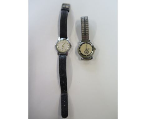 An Accurist mid size manual wind wristwatch, 32 cm wide including button , running  And an Oris manual wind watch running but