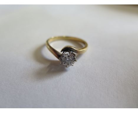 An 18ct yellow gold illusion set diamond solitaire ring marked 18ct - size P - approx 4 grams  - clean condition 