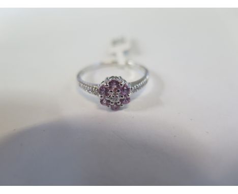 A hallmarked 9ct white gold pink topaz and diamond ring, size Q, approx 1.7 grams - new condition, ex jewellers stock 