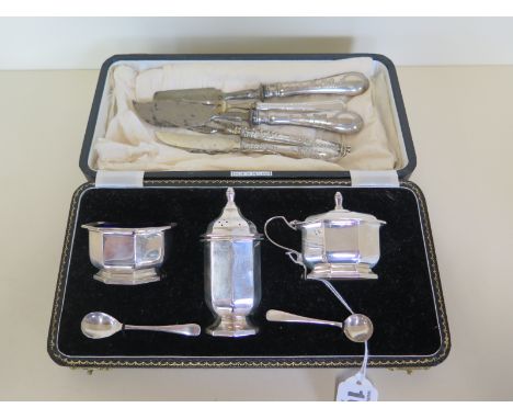 A cased Henry Clifford Davies, silver cruet set hallmarked Birmingham 1956, 4.5toz together with a silver spoon, fork and fiv