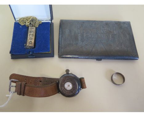 A silver cigarette case made in India during World War II, a silver ingot pendant, a silver cased vintage Gentleman's wristwa
