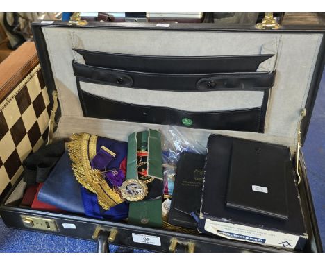 BRIEFCASE CONTAINING LARGE QUANTITY OF MASONIC ITEMS INCLUDING MEDALS, APRONS, PAPERWORK, BIBLE, CHESS BOARD AND PIECES