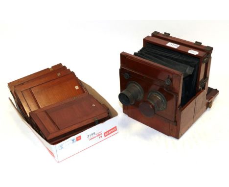 Stereo Half Plate Camera no maker mark, mahogany body with brass fittings, twin Dallmeyer brass lenses and five plate holders