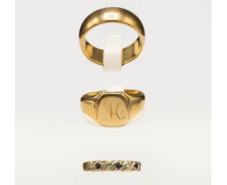 THREE 9CT GOLD RINGS. comprising a diamond and sapphire seven stone dress ring, size L; a signet ring, size T; plus a gents w