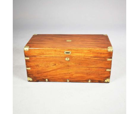 19TH CENTURY CHINESE EXPORT TRUNK. camphorwood and brass bound with iron handles, 46cm H x 101cm W x 50cm D.