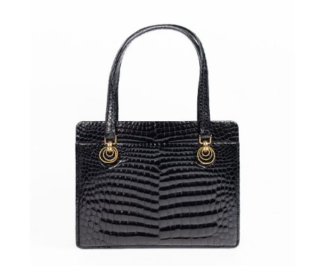 VINTAGE GUCCI EXOTIC LEATHER HANDBAG. two external pockets, one at each side, main compartment with one zippered pocket and t