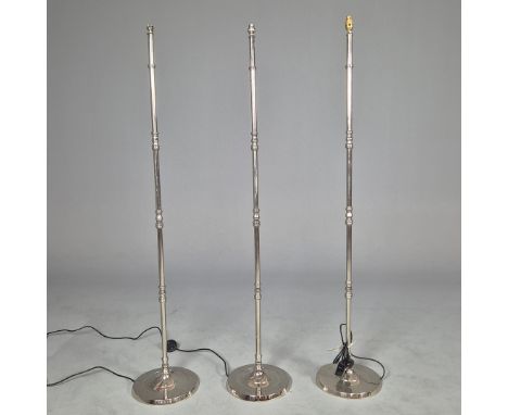 INDIA JANE FLOOR LAMPS, A NEAR SET OF 3. one lamp fitting broken and one with larger lamp fitting, 161.5cm at tallest approx.