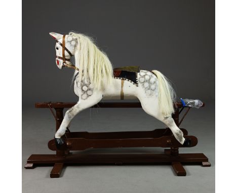 VINTAGE ROCKING HORSE. Painted wood114cm H x 155cm W x 35cm D.