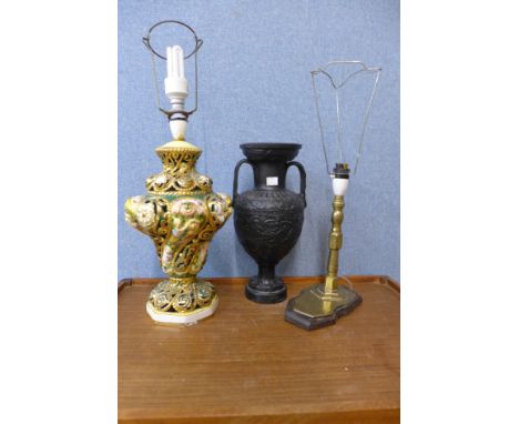 An Italian porcelain table lamp, a brass table lamp and a Romanesque painted vase 