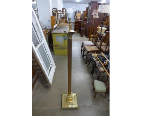 A brass Corinthian column standard lamp 