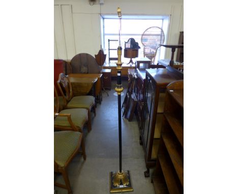A black and parcel gilt standard lamp 