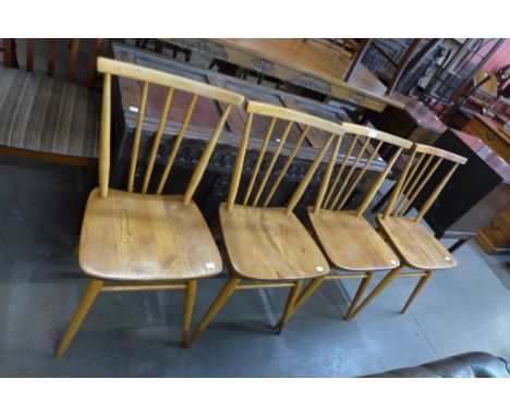 A set of four Ercol Blonde 391 model elm and beech chairs 
