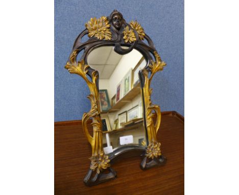 An Art Nouveau style gilt framed dressing table strut mirror 