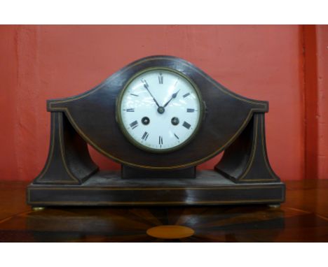 A French Art Nouveau inlaid mahogany timepiece 
