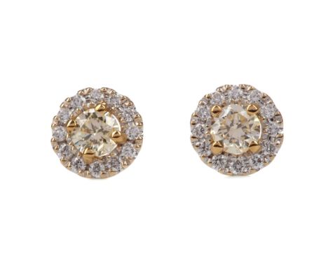 PAIR OF CERTIFICATED YELLOW DIAMOND STUD EARRINGS, set with round brilliant cut yellow diamonds of approximately 0.40 carats,