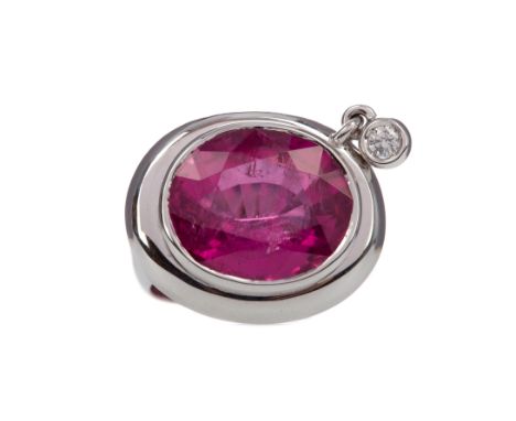 PINK TOURMALINE AND DIAMOND RING, set with an oval pink tourmaline of approximately 18.00 carats, with suspended bezel set ro