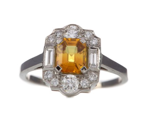 CERTIFICATED YELLOW SAPPHIRE AND DIAMOND RING, set with an emerald cut yellow sapphire of approximately 1.30 carats. with ind