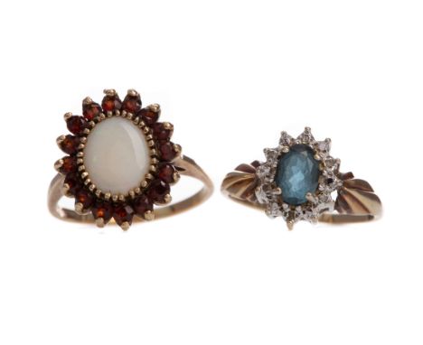 OPAL AND GARNET CLUSTER RING, set with an oval opal within a halo of round garnets, in nine carat gold, size Q, along with a 