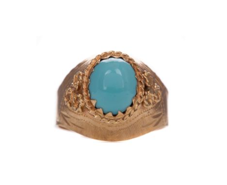 TURQUOISE RING, set with an oval cabochon turquoise, with ropetwist border and engraved decoration, marked 750, size P 1/2, 7