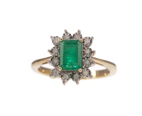 EMERALD AND DIAMOND RING, the emerald cut emerald of approximately 0.98 carats within an illusion set diamond halo totalling 