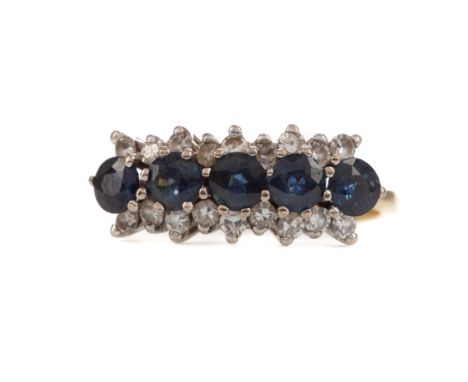 SAPPHIRE AND DIAMOND RING, set with a row of round sapphires bordered by round brilliant cut diamonds totalling approximately