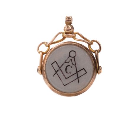 MASONIC SWIVEL FOB, of circular form with engraved square and compass motif, marks worn, 6.7g