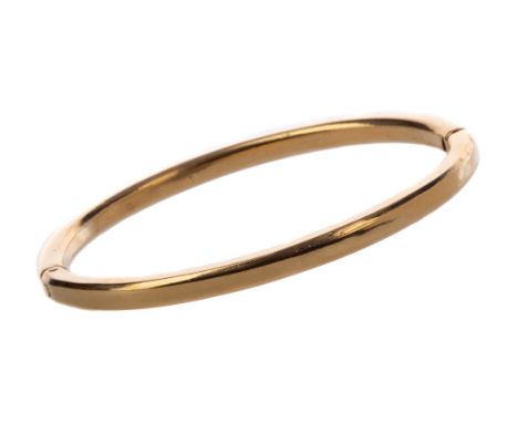 UNMARKED BANGLE, of oval form, 49.8g