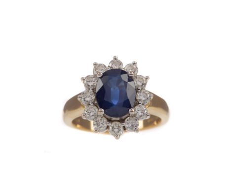 SAPPHIRE AND DIAMOND RING, the oval sapphire within a halo of round brilliant cut diamonds totalling approximately 0.60 carat