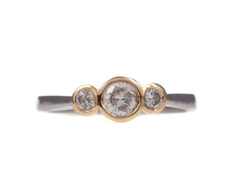 DIAMOND THREE STONE RING, set with round brilliant cut diamonds totalling approximately 0.35 carats, in nine carat white gold