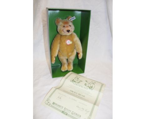 A Steiff limited edition "Dicky 1930" replica teddy bear in original box with certificate