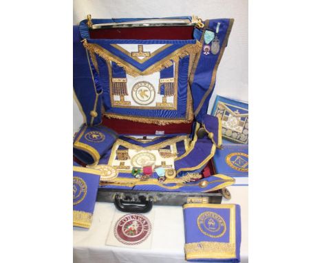 A case containing various Cornwall and Devon Masonic regalia including Cornwall apron with cuffs and sash, three Cornish Maso