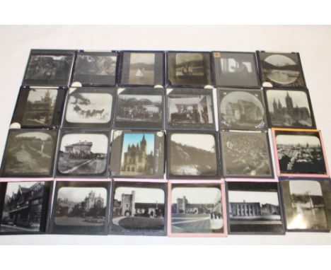 A box containing a selection of various magic lantern photographic plates including two studies of early Eskimos, dogs and sl