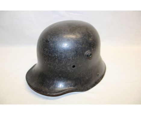 A First War German 1916 pattern steel helmet