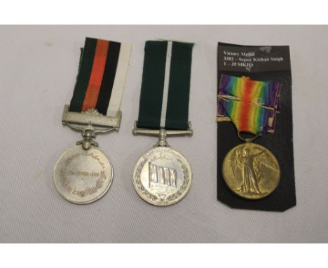 A First War Victory Medal awarded to No. 3382 Sepoy K. Singh 1-35 Sikhs; a Pakistan Independence Medal awarded to No. SR18006
