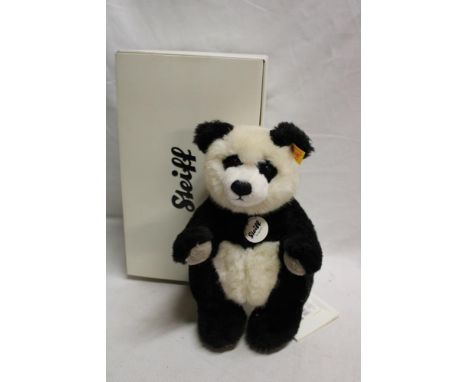 A modern Steiff panda bear in original box